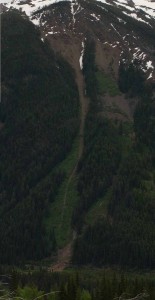 View of the avalanche start zone & debris pile on the road
